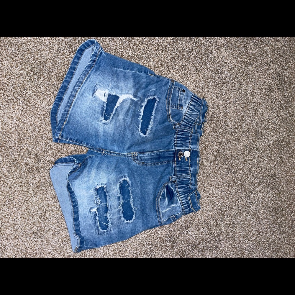 Blue ripped jean shorts